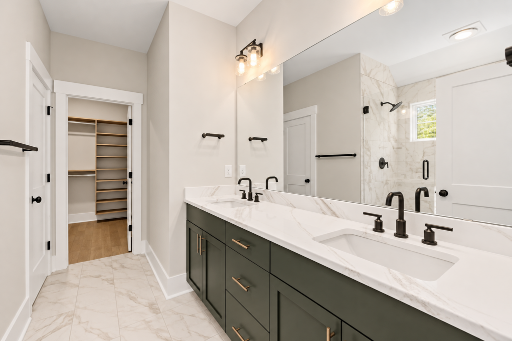Primary bath with green double vanity